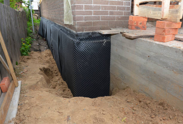 SJ Waterproofing Pros technician performing targeted Emergency Waterproofing assessment in Hanover, IN